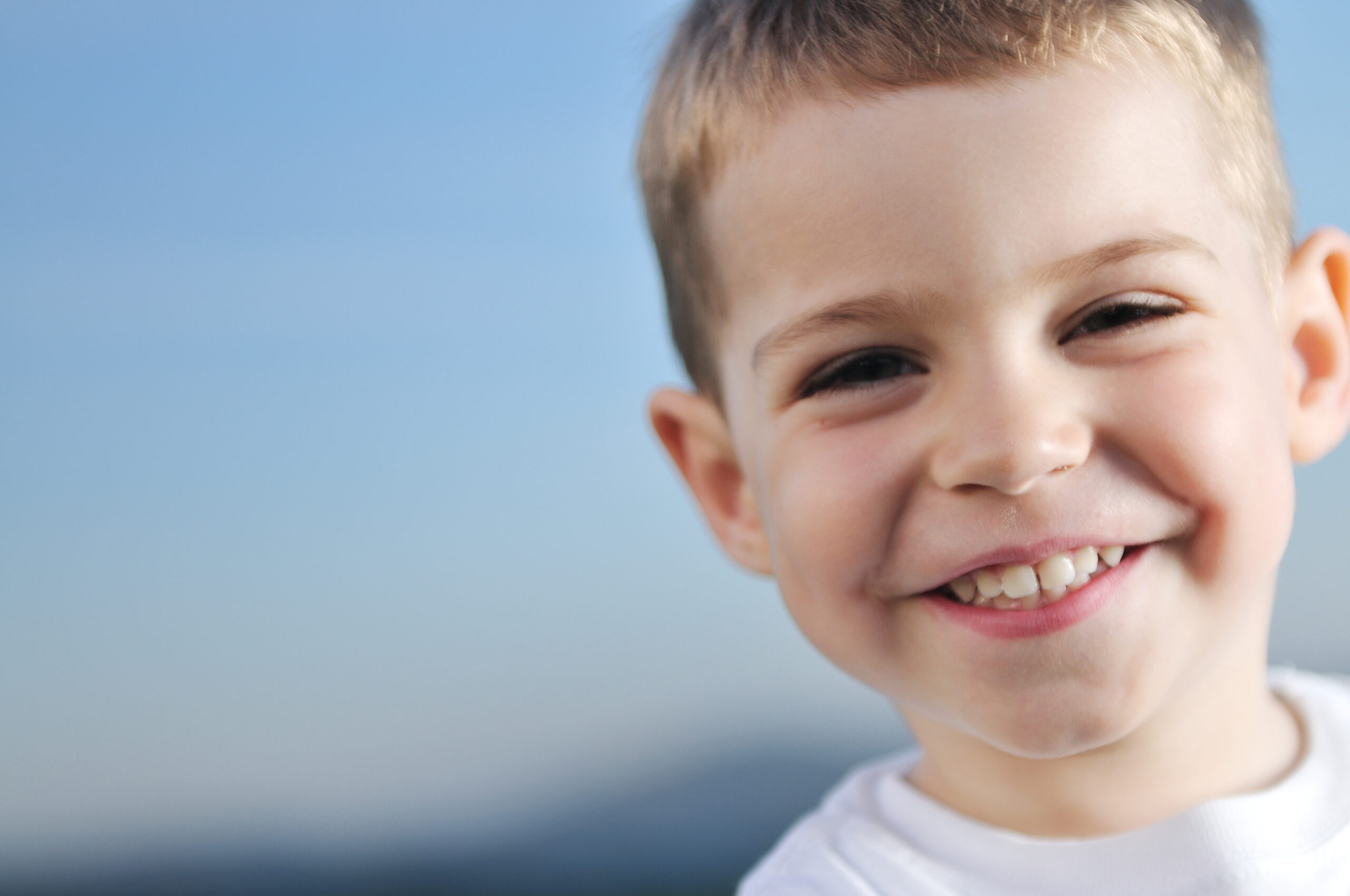 happy young boy child outdoor portrait